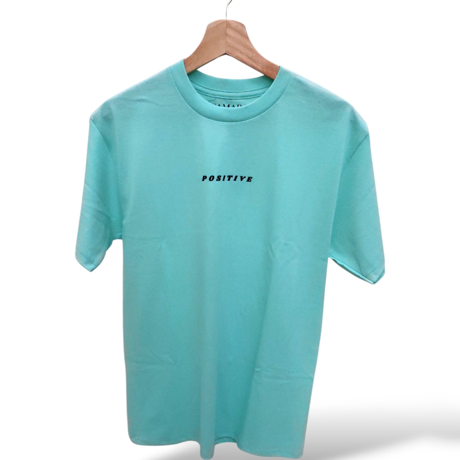 Playera menta de cuello redondo, diseño positive